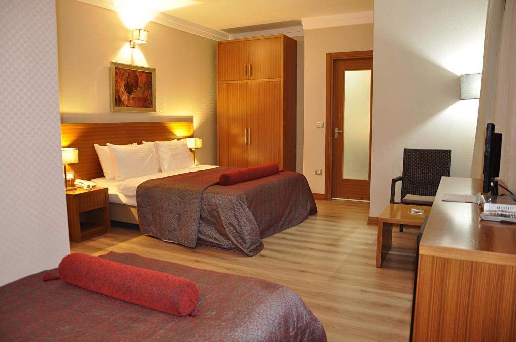 TV a/nebo společenská místnost v ubytování Island Hotel