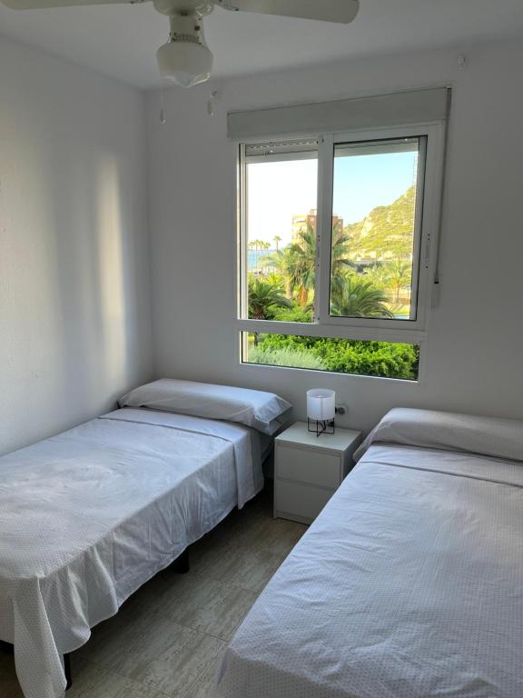 Postel nebo postele na pokoji v ubytování Superbe appartement à 200 mètre de la mer