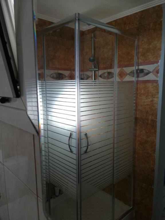 A bathroom at Alexander Apartments Nea Koutali