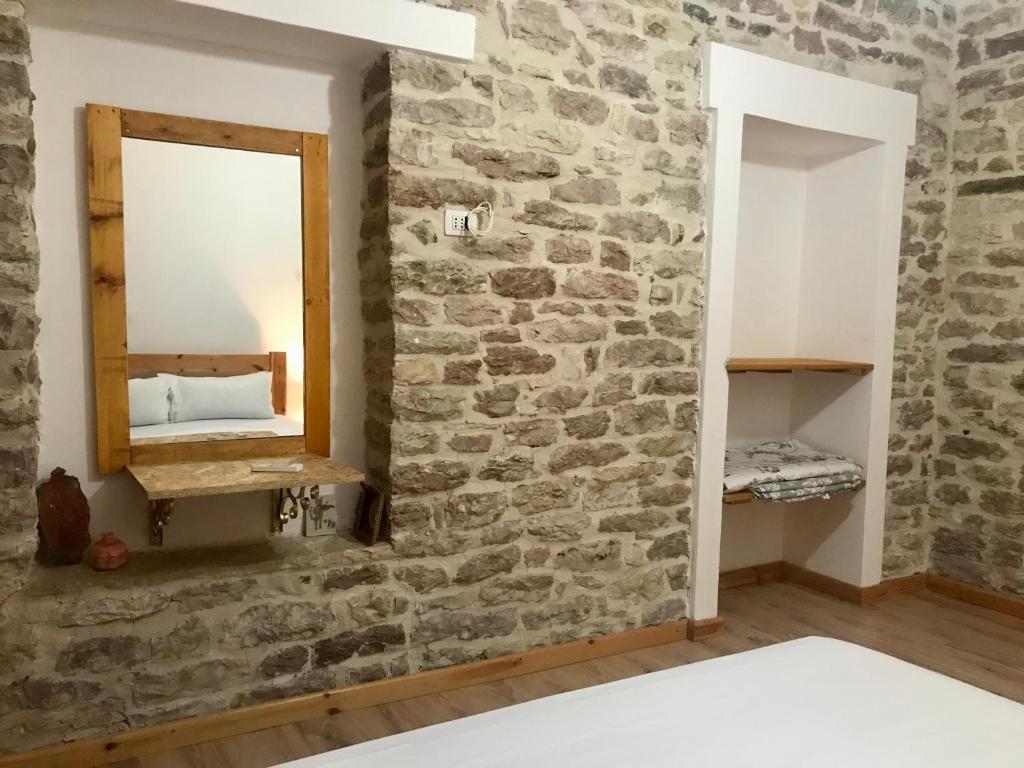 Postel nebo postele na pokoji v ubytování Vila ERI