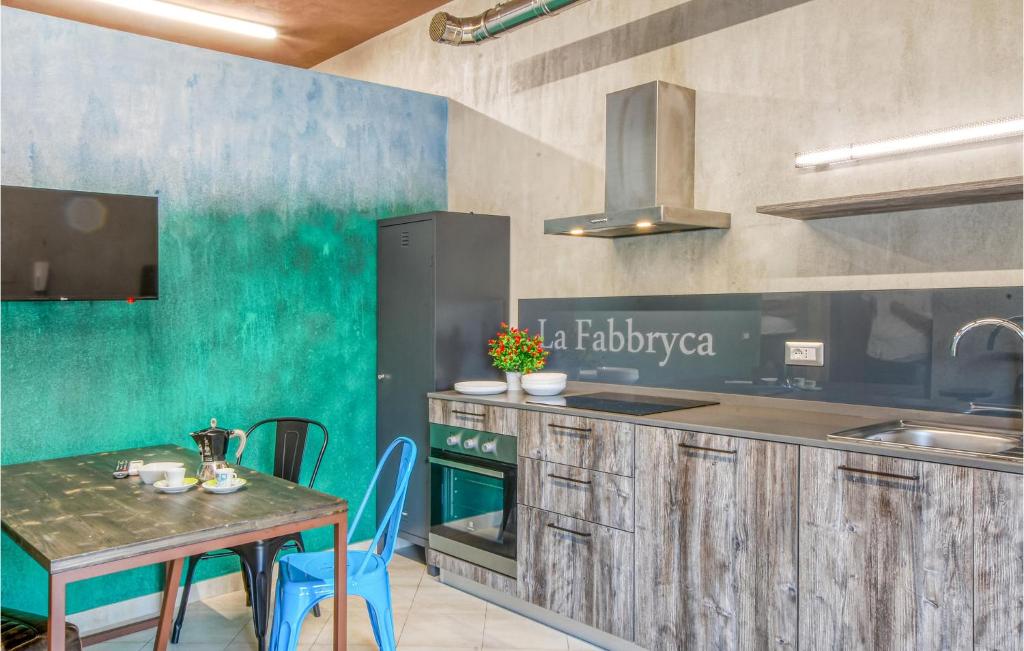 Kuchyňa alebo kuchynka v ubytovaní Cozy Apartment In Porto Santelpidio