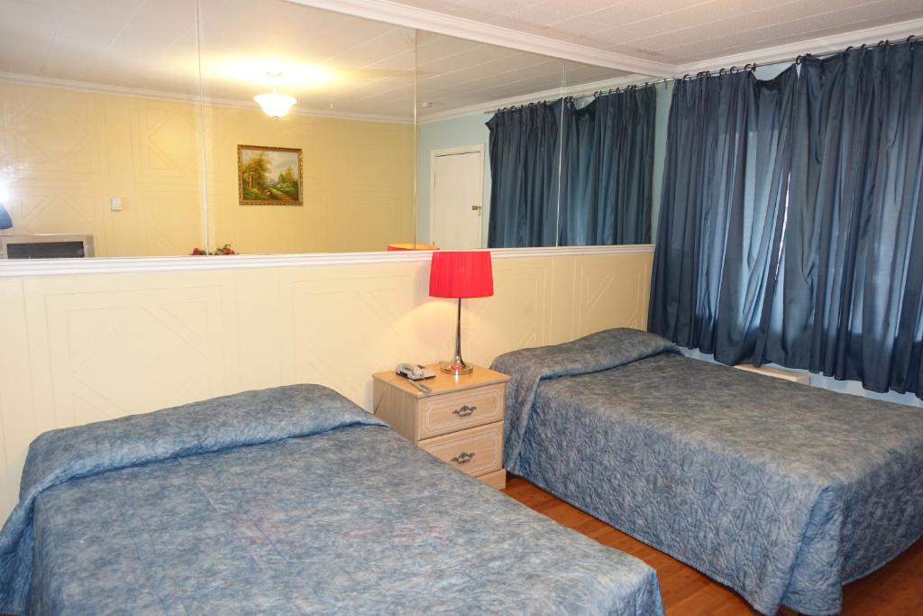 Motel Pierre - Quarto Duplo Com Duas Camas De Casal