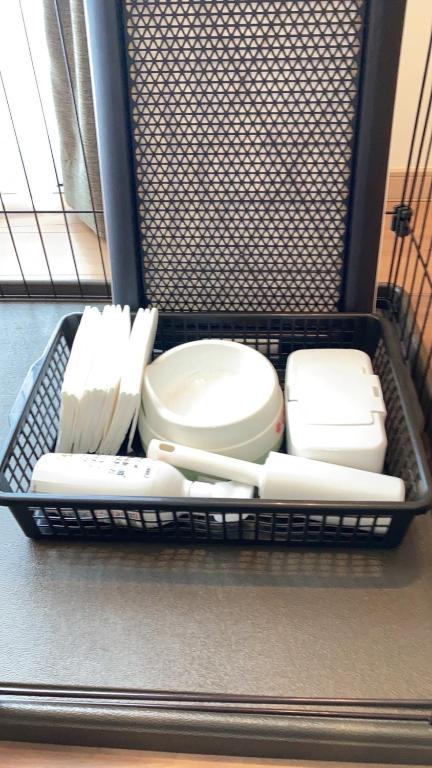 a basket full of utensils sitting on a table at KAI Ichinomiya in Ichinomiya