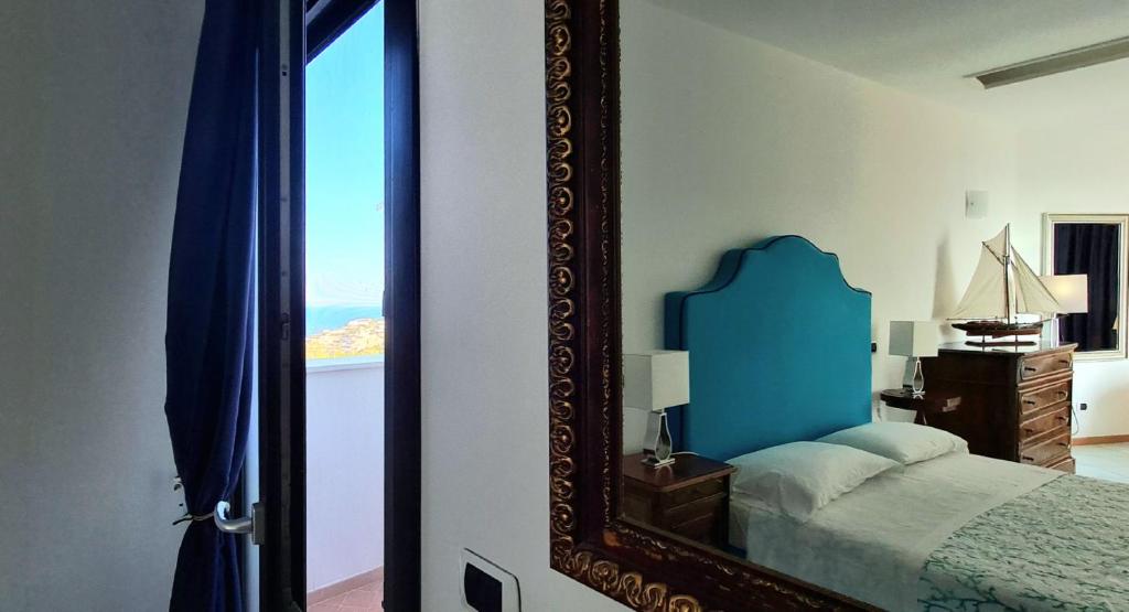 Postel nebo postele na pokoji v ubytování Guest House Villa Il Gabbiano