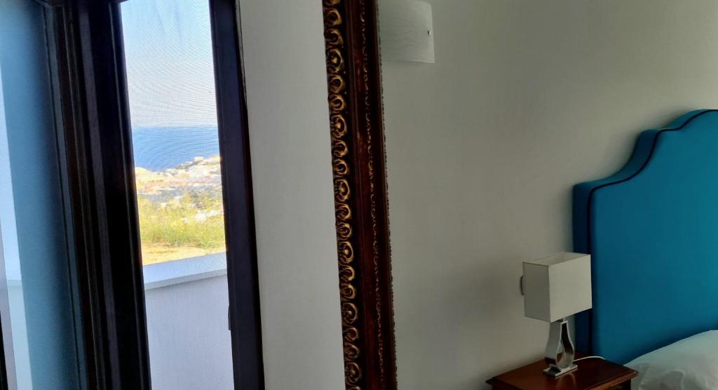 Postel nebo postele na pokoji v ubytování Guest House Villa Il Gabbiano