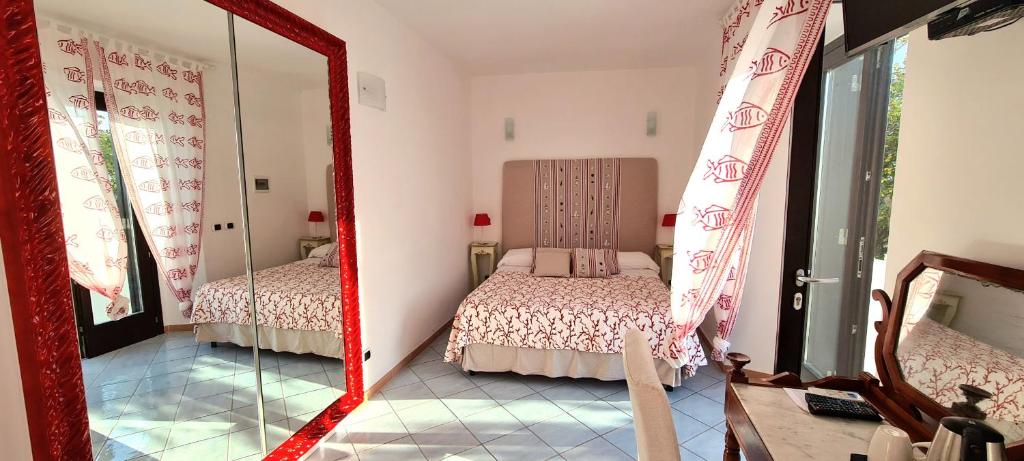 Postel nebo postele na pokoji v ubytování Guest House Villa Il Gabbiano