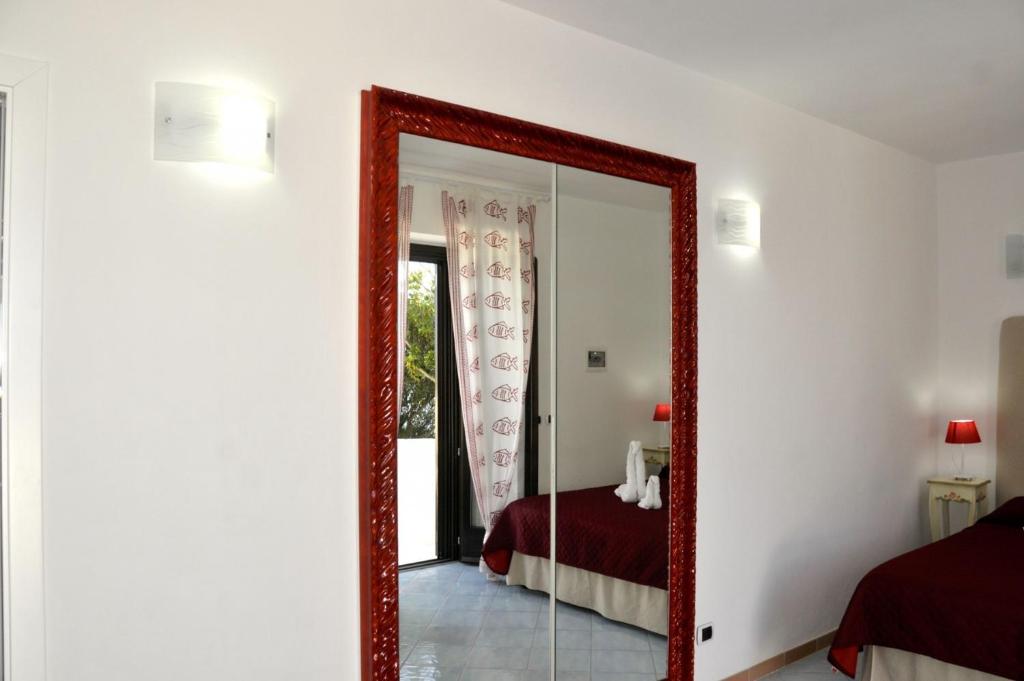 Postel nebo postele na pokoji v ubytování Guest House Villa Il Gabbiano