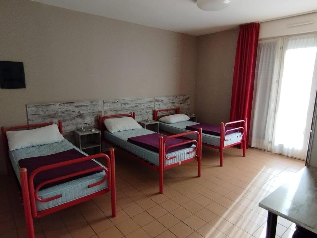 TV a/nebo společenská místnost v ubytování Ostello Torino