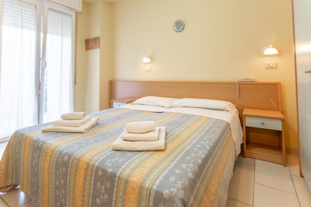 Postel nebo postele na pokoji v ubytování HOTEL VALPARAISO
