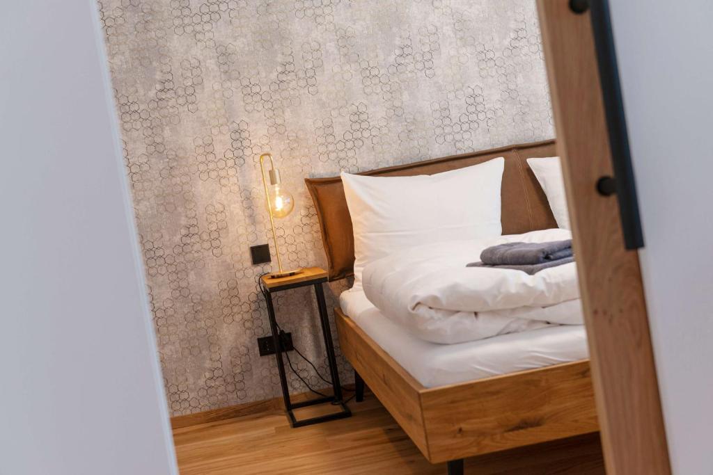 Postel nebo postele na pokoji v ubytování Apartment am Grundlsee