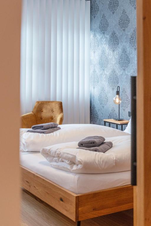 Postel nebo postele na pokoji v ubytování Apartment am Grundlsee