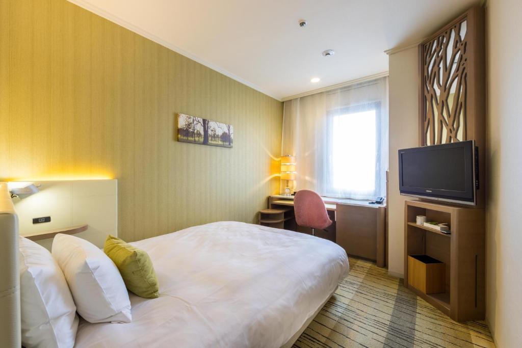 TV a/nebo společenská místnost v ubytování Kichijoji Excel Hotel Tokyu