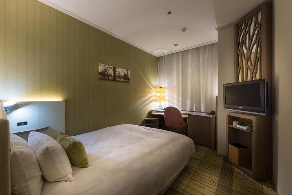 TV a/nebo společenská místnost v ubytování Kichijoji Excel Hotel Tokyu