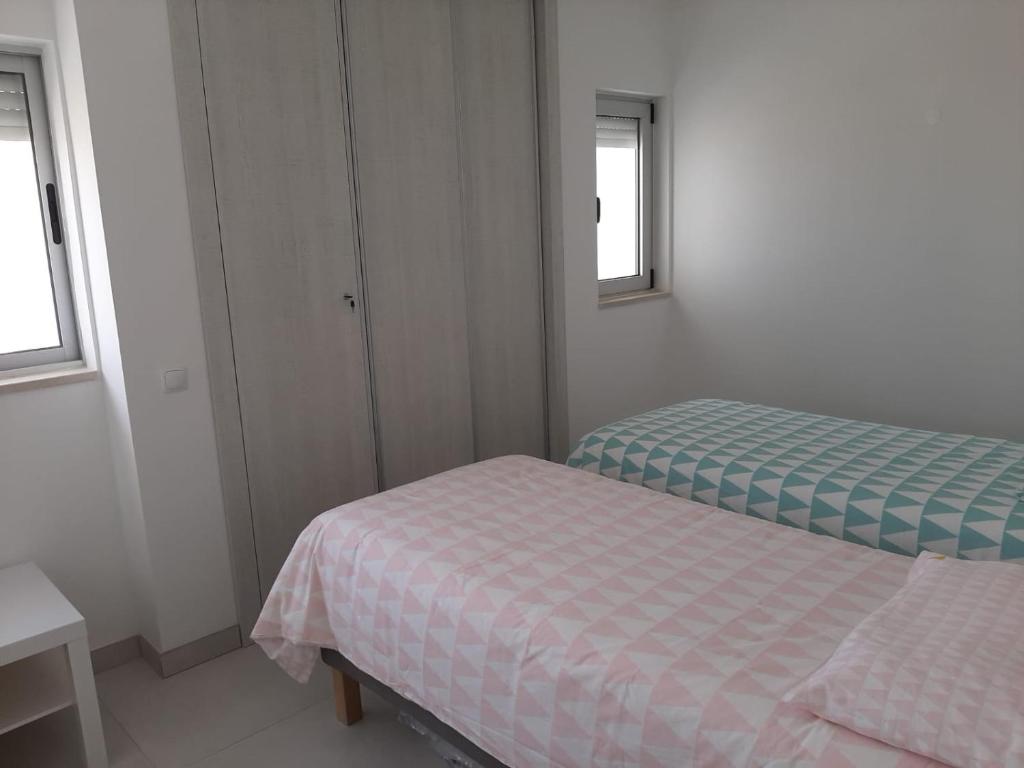 Ένα ή περισσότερα κρεβάτια σε δωμάτιο στο Vue Ocean