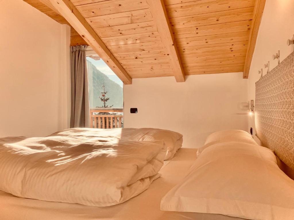 Postel nebo postele na pokoji v ubytování Eurochalet