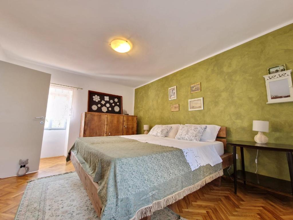 Postel nebo postele na pokoji v ubytování House Nono Bepo in small Istrian village