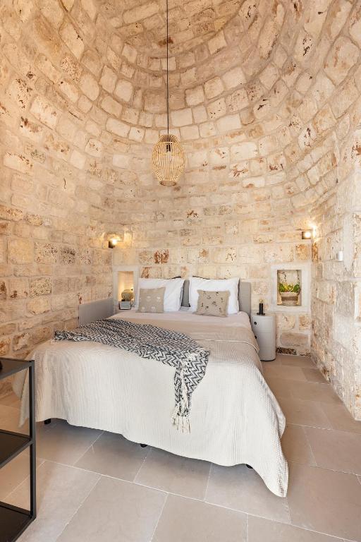 Posteľ alebo postele v izbe v ubytovaní Vilaa Isa Beautiful Villa and trullo in Ostuni