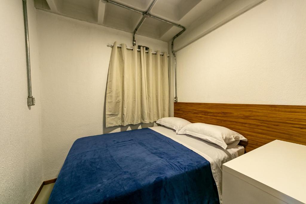 Postel nebo postele na pokoji v ubytování Antiquus ApartHotel
