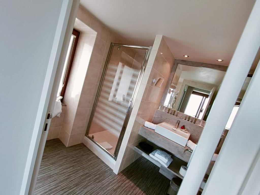 Koupelna v ubytování Hotel Le Léman