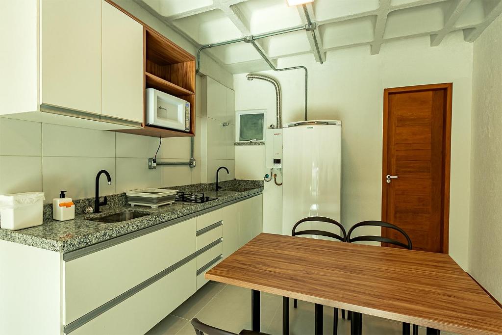 Kuchyň nebo kuchyňský kout v ubytování Antiquus ApartHotel