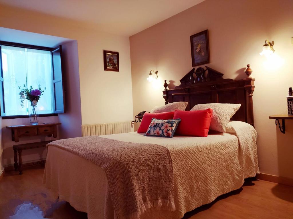 Postel nebo postele na pokoji v ubytování Pazo Xan Xordo