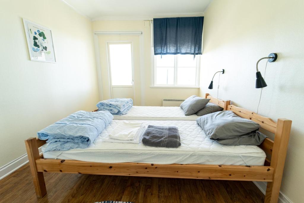 Postel nebo postele na pokoji v ubytování Hostel Utö