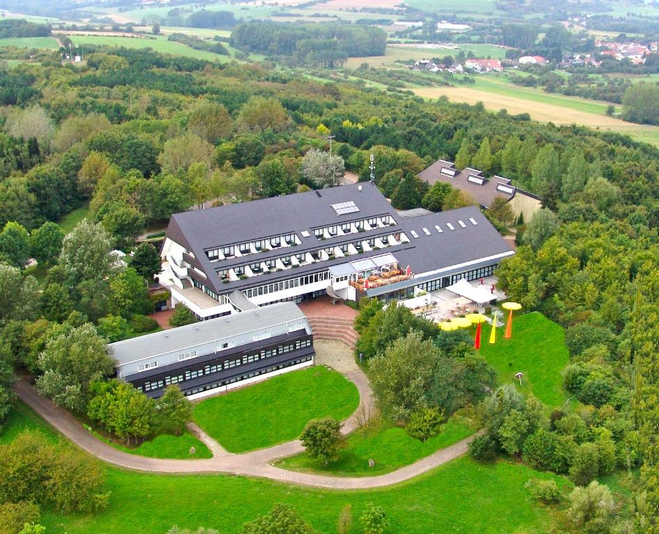 an overhead view of a building in a field at Hotel Scheidberg in Wallerfangen