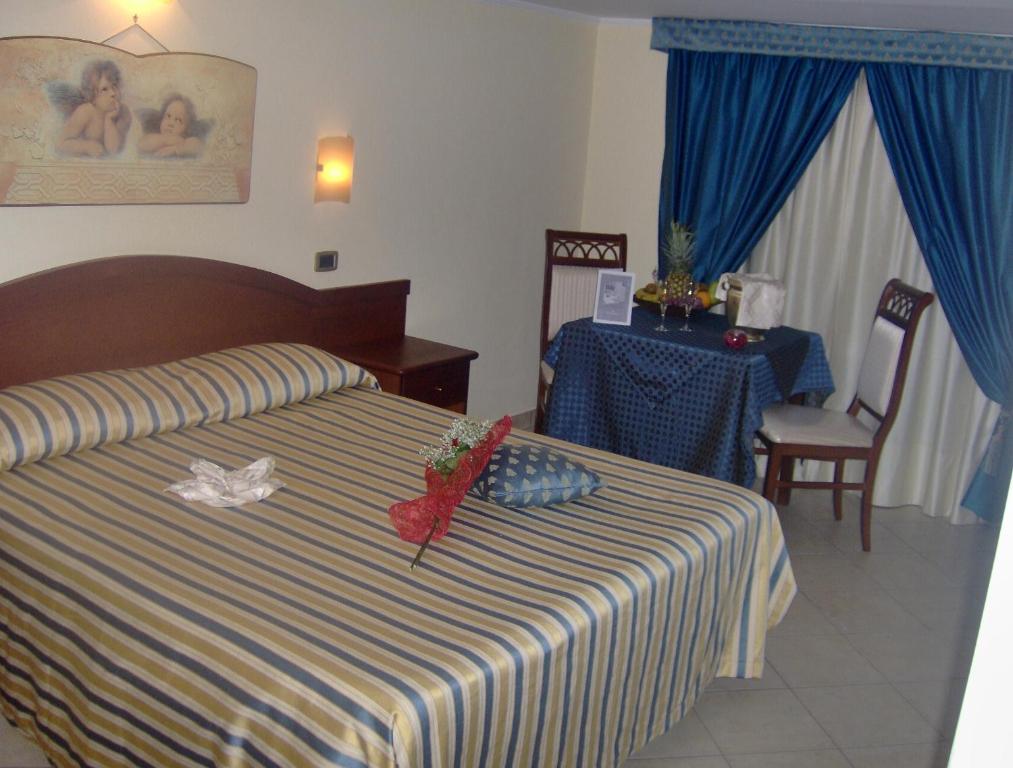 Postel nebo postele na pokoji v ubytování Cridda Hotel & Restaurant
