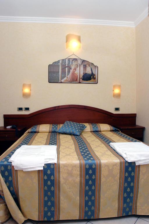 Postel nebo postele na pokoji v ubytování Cridda Hotel & Restaurant