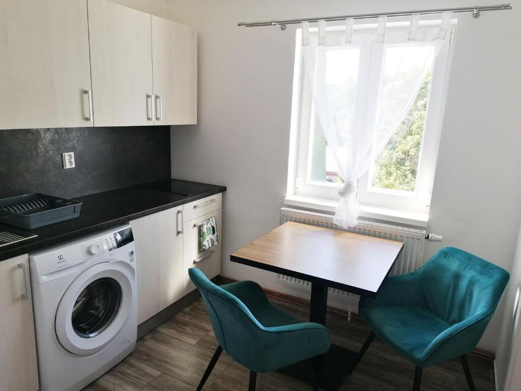 Kuchyň nebo kuchyňský kout v ubytování Apartmány Plzeň Zábělá 69