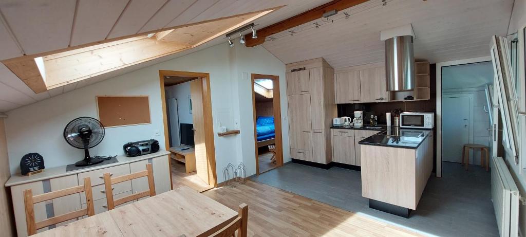 Kuchyň nebo kuchyňský kout v ubytování Chalet Sunnmätteli
