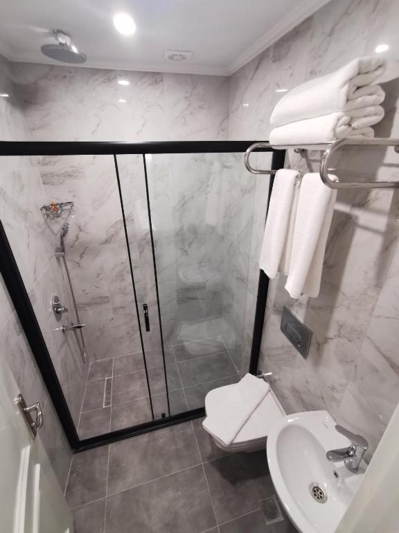 Koupelna v ubytování Luxx Garden Hotel