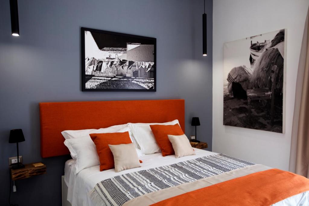 Postel nebo postele na pokoji v ubytování Scugnizzo Apartment Luxury Home