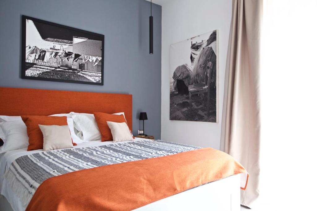 Postel nebo postele na pokoji v ubytování Scugnizzo Apartment Luxury Home