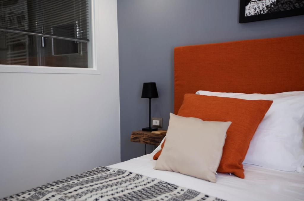 Postel nebo postele na pokoji v ubytování Scugnizzo Apartment Luxury Home