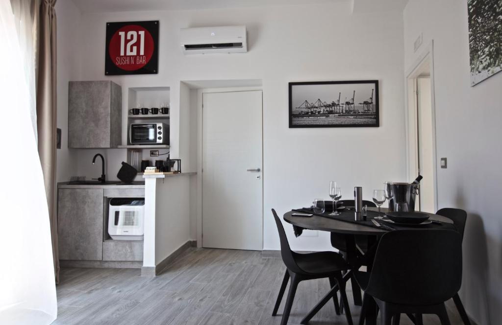 Kuchyň nebo kuchyňský kout v ubytování Scugnizzo Apartment Luxury Home