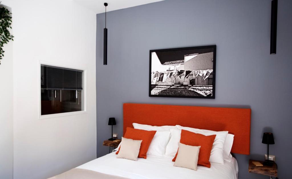 Postel nebo postele na pokoji v ubytování Scugnizzo Apartment Luxury Home