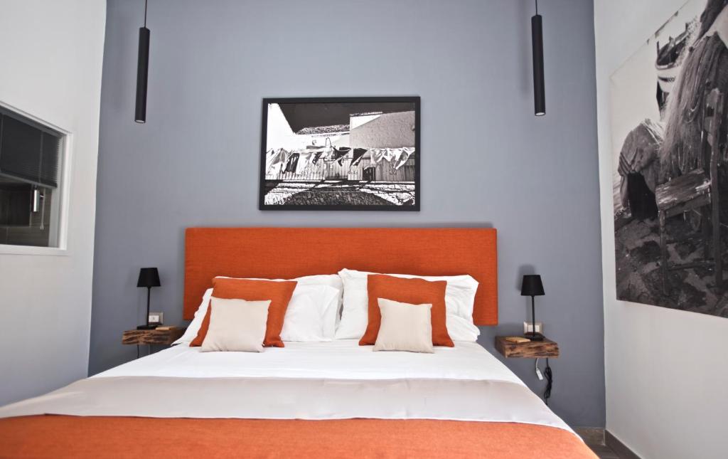 Postel nebo postele na pokoji v ubytování Scugnizzo Apartment Luxury Home