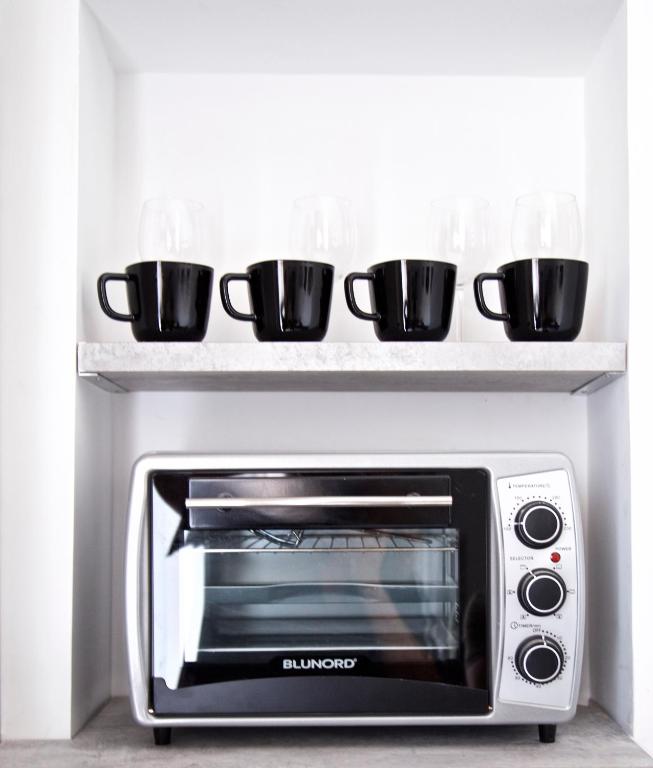Kuchyň nebo kuchyňský kout v ubytování Scugnizzo Apartment Luxury Home
