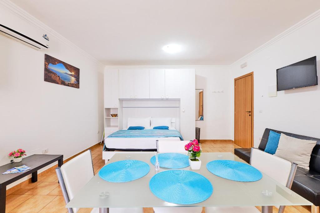 TV a/nebo společenská místnost v ubytování Casa Mazzini