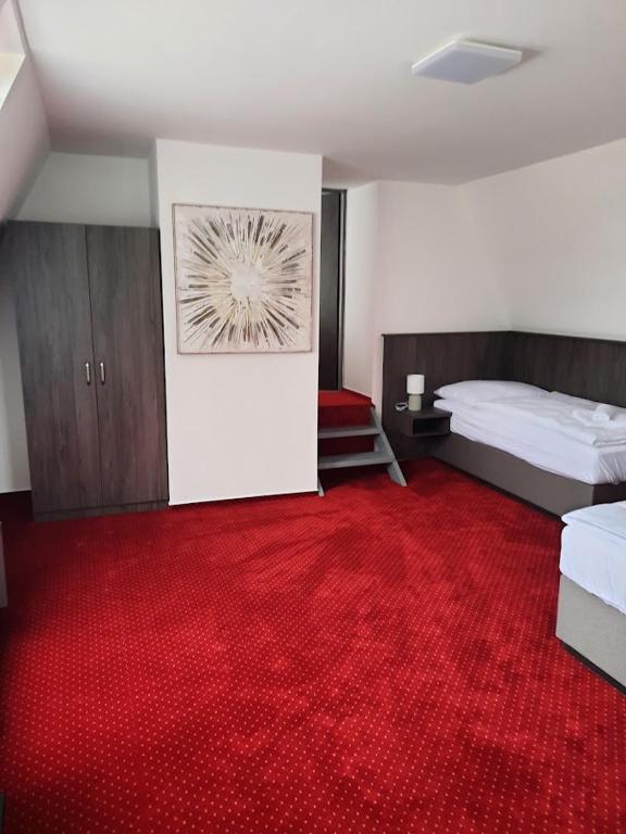 Postel nebo postele na pokoji v ubytování Hotel Orka