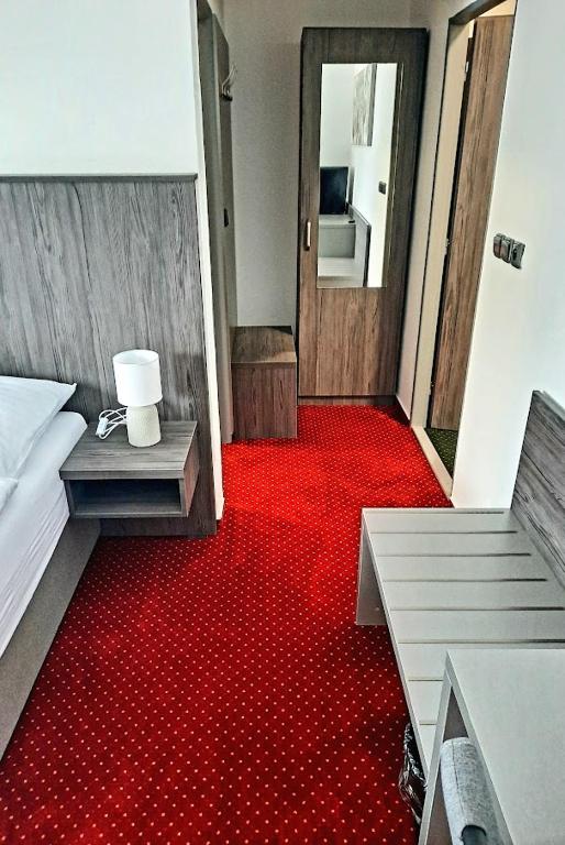 Postel nebo postele na pokoji v ubytování Hotel Orka