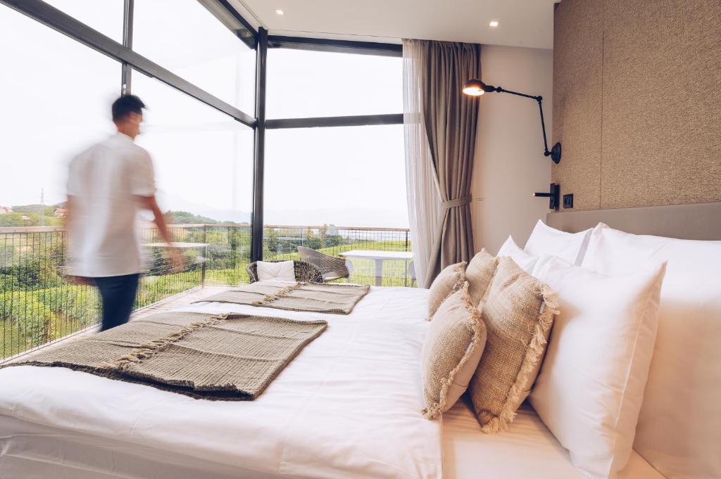 Postel nebo postele na pokoji v ubytování Tri lučke Hotel & Restaurant