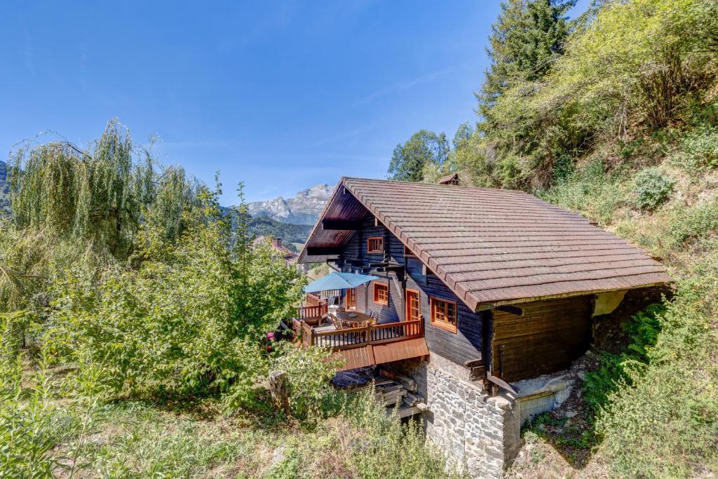 a house on the side of a hill at La Forge in Manigod