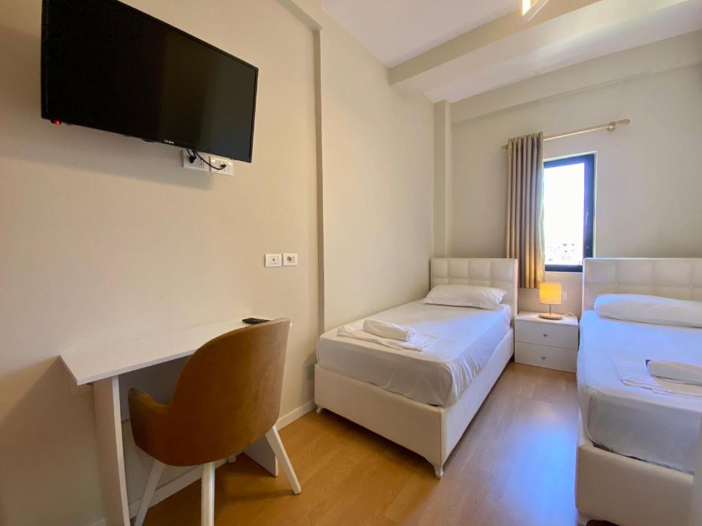 Postel nebo postele na pokoji v ubytování Hotel Globo