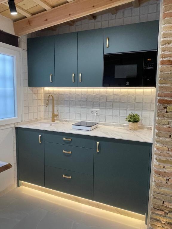 Kuchyň nebo kuchyňský kout v ubytování Extramuros 15C Loft Estudio