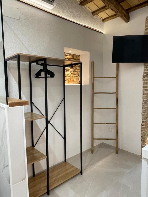 TV a/nebo společenská místnost v ubytování Extramuros 15C Loft Estudio