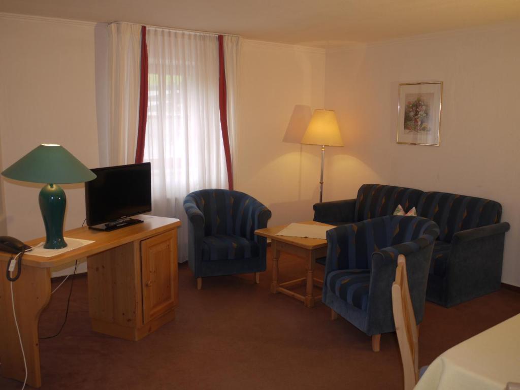 TV a/nebo společenská místnost v ubytování Aparthotel Fackler