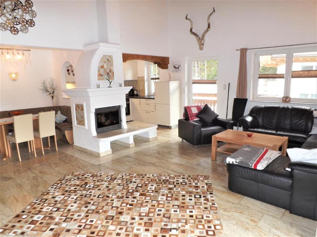 Un lugar para sentarse en Kaiser Suite, Apartments Scheffau