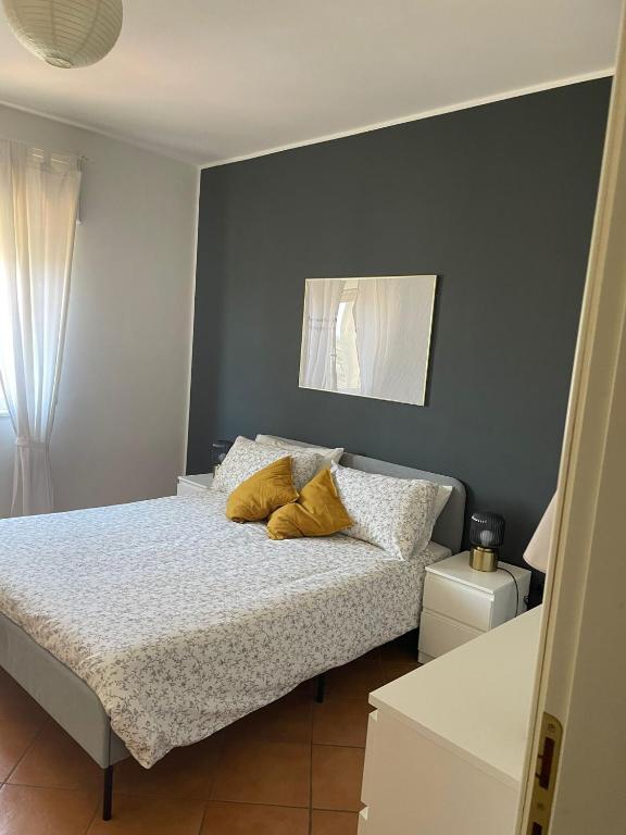 Posteľ alebo postele v izbe v ubytovaní MammaRo's House